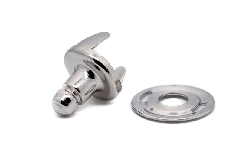 Two-Prong Lift-the-Dot Clinch-and-Plate Fastener for Fabric-to-Fabric Use